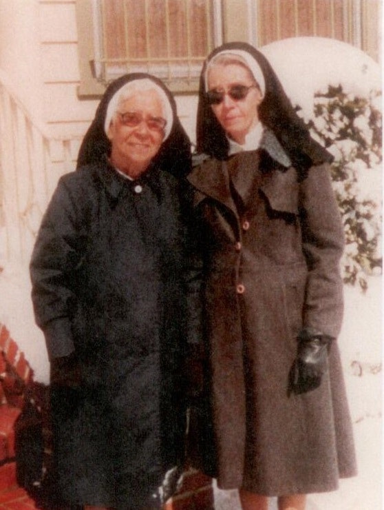 Sister Mary Ignatius Davies and Sister Mary Theresa March, taken in New York in 1984, by Charles Simpson during an Alpha Boys School event. It was the first time Sister Ignatius had seen snow.